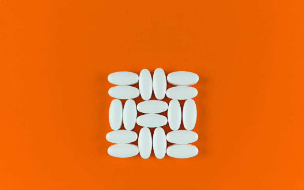 magnésio dimalato e fundo laranja